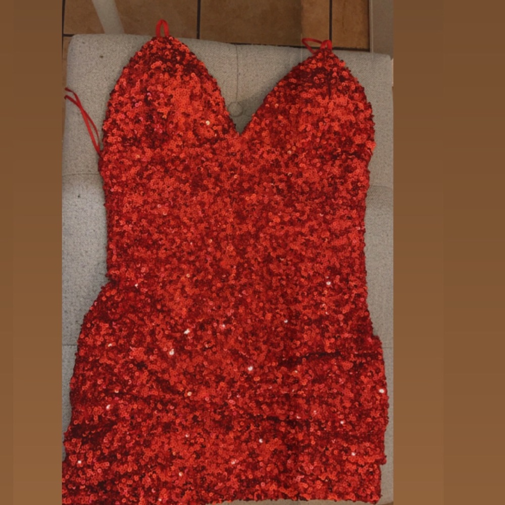 I wore this very cute and sexy red mini dress once for my 21st birthday party